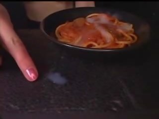 Japanese girl eats spaghetti with cum