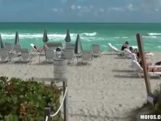 Sunbathing beach babe fucks a stranger