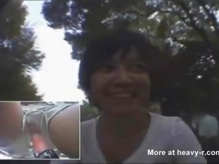 Asian girl rides fuck bike outdoors