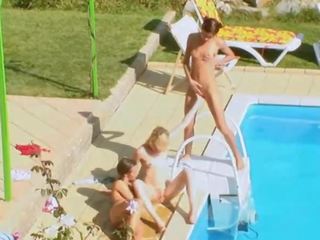 Three girls secret fucking by the pool