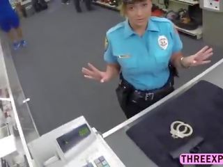 Brunette police woman pose nude and takes huge cock in the pawnshop
