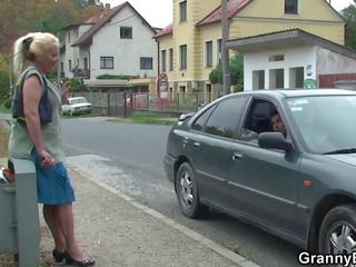 Hitchhiking old granny and boy